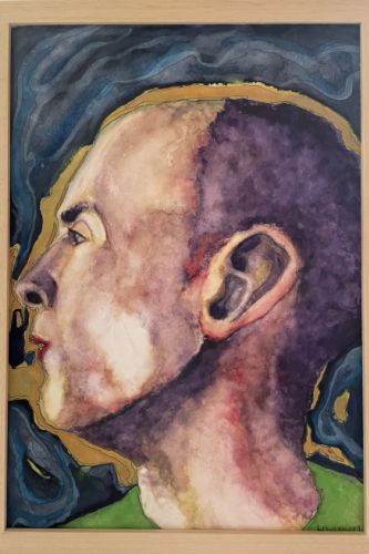 Visage de profil au fond bleu